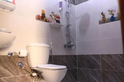 a bathroom with a toilet and a sink at Magic Place Luxor in Luxor