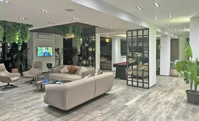 a living room with a couch and chairs and a table at Imperial Resort Apt Sleeps 3 - Pool Parking Wifi in Hurghada