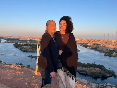 a man and a woman standing on top of a river at Alara Hostel 