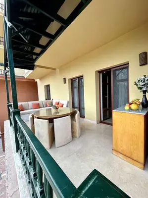 a living room with a couch and a table at SunShine AbuTig Marina in Hurghada