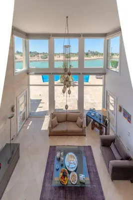 a living room with a couch and a table at Golf Luxury villa with private pool in Hurghada