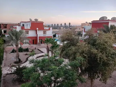 a view of a city with trees and buildings at فيلا 1☆ in Hurghada