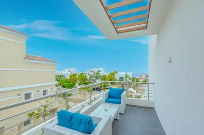 a balcony with a view of the ocean at unique villa with heated pool and Spa in Hurghada
