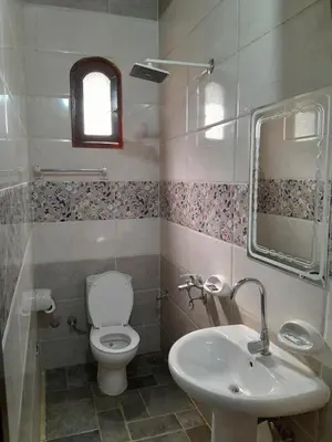 a bathroom with a toilet and a sink at Kashta Nubian Guest Houst in Aswan