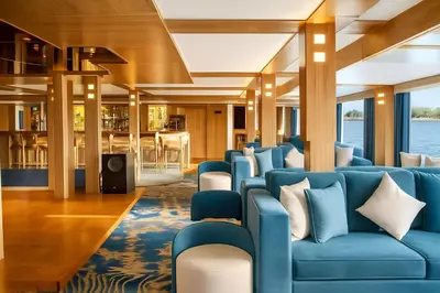 a waiting room on a cruise ship with blue couches at Five Star Deluxe River Kruz from Aswan to Luxor 3 Nights in Aswan