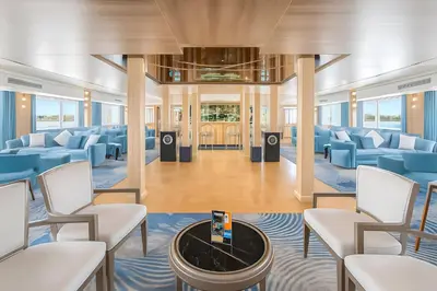 a waiting room on a cruise ship with chairs and a table at Five Star Deluxe River Kruz from Aswan to Luxor 3 Nights in Aswan