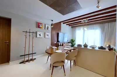 a dining room with a table and chairs at Captivating 1 BDR Fanadir Marina in Hurghada
