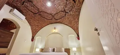 a room with two beds in a church at West Bank luxury villa in Luxor