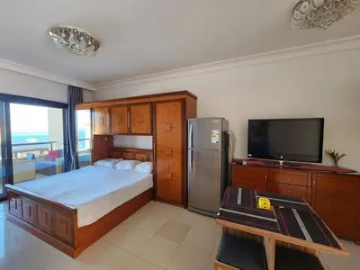 a bedroom with a bed and a flat screen tv at apartment in hurghada307 in Hurghada