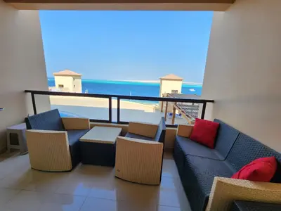 a living room with a view of the ocean at apartment in hurghada307 in Hurghada