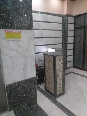 a room with a pillar and a table in a building at شقة 327صغيرة جميلة هادئة وسط المدينة in Hurghada