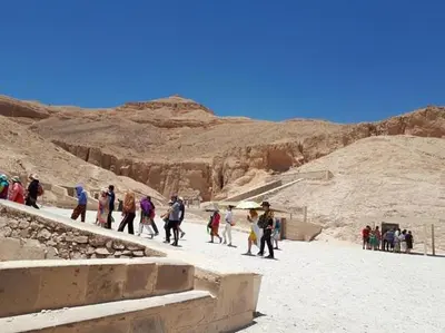 a group of people walking in the desert at Royal Cruise Aswan to Luxor 3 Night And visit the Nubian village in Luxor