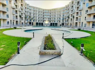 a large apartment building with a large courtyard at Perfect for couples, Sunny & SeaView & Free Wi-fi in Hurghada