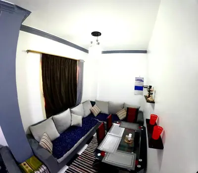 a living room with a couch and a table at hurghada home in Safaga