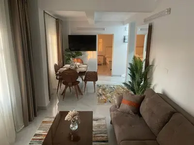 a living room with a couch and a table at Tony HOUSE in Aswan