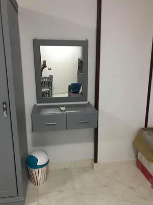 a bathroom with a sink and a mirror on the wall at Tiba view in Hurghada