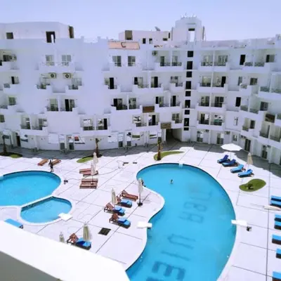 an aerial view of a hotel with two pools at Tiba view in Hurghada