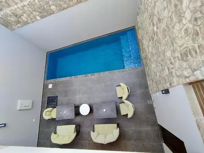 an overhead view of a swimming pool in a room at Bali c 3 D in Hurghada