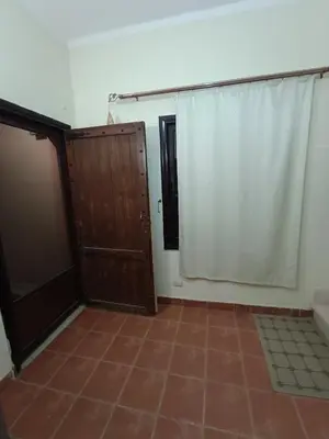 a room with a door and a tiled floor at sahl hashesh makadi- hurghada- in Hurghada
