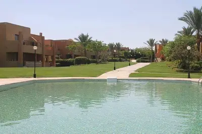 a large swimming pool in front of a building at sahl hashesh makadi- hurghada- in Hurghada