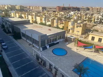 an overhead view of a building with a basketball court at Fanadir bay in Hurghada