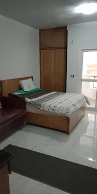 a bedroom with a large bed in a room at Tibaview in Hurghada
