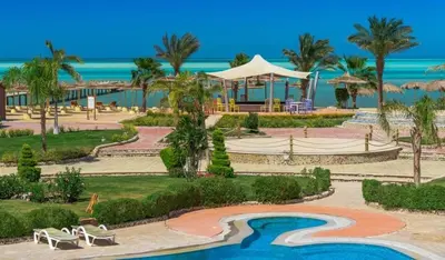 a resort with a swimming pool and a resort at Royal Beach G 05 in Hurghada