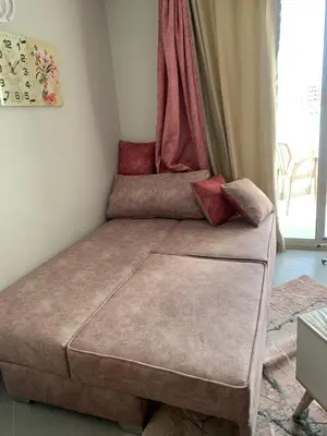a bed in a corner of a room at Scandic beach resort in Hurghada