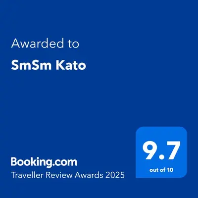 a blue screen with the text awarded to smm kato at SmSm Kato in Aswan