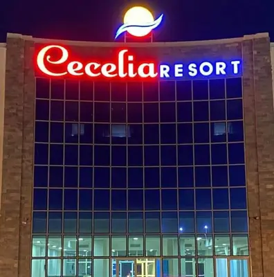 a sign on the side of a building at Harmony Sunny Chalet With Wi-Fi in Hurghada