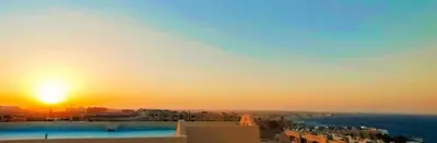 a view of the sunset from a building at The view compound in Hurghada
