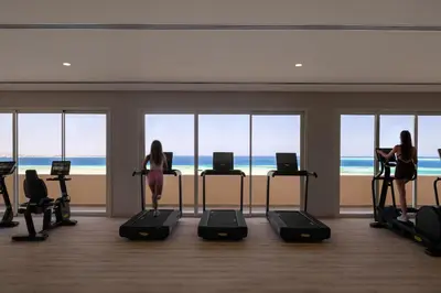 a group of women exercising on treadying machines in a gym at JAZ Elite Asteria in Hurghada