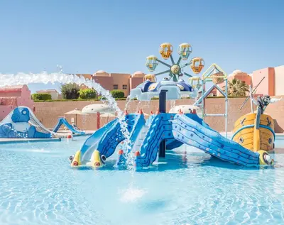 a water park with a water slide in the water at Serenity Alma Heights - Ex Serenity Fun City in Hurghada