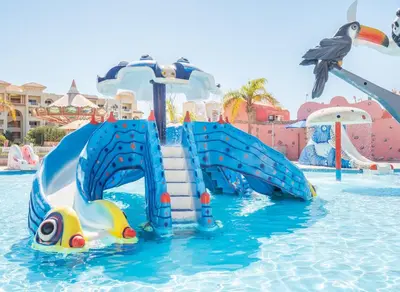 a water slide in a pool at a water park at Serenity Alma Heights - Ex Serenity Fun City in Hurghada