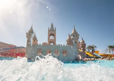 a castle in the water at the walt disney world resort at Serenity Alma Heights - Ex Serenity Fun City in Hurghada