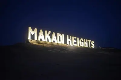 a large sign that says madrid lights at night at Makadi heights luxury apartment in Hurghada