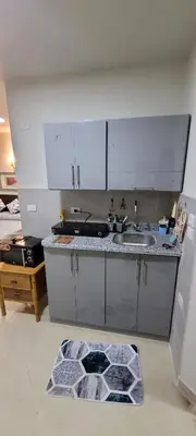 a kitchen with a sink and a counter top at Hotel Room in Princess Resort With Beach Acces & Free Wi-fi I Near Air port in Hurghada