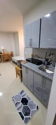 a kitchen with a sink and a counter top at Hotel Room in Princess Resort With Beach Acces & Free Wi-fi I Near Air port in Hurghada