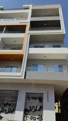 a tall building with graffiti on the side of it at Condo with Breathtaking 's view with 2 bedrooms in Hurghada