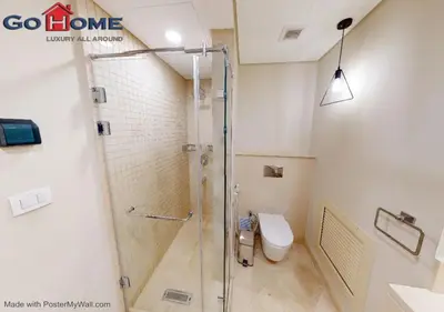 a bathroom with a shower and a toilet at Stylish 1BR @ Mangroovy-M7-6B in Hurghada