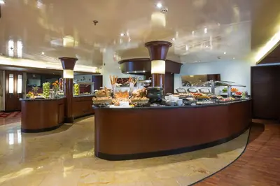 a lobby with a counter with food on it at M/Y ALYSSA - 4 or 7 Nights From Luxor each Monday and 3 or 7 Nights From Aswan each Friday in Luxor