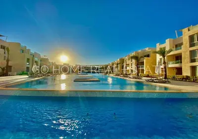 a large swimming pool in the middle of a building at Beautiful 2 Bed Rooms at Mangaroveey M7-4B-El-Gouna in Hurghada