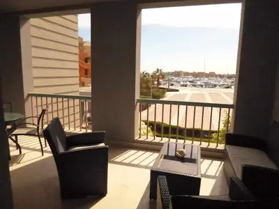 a balcony with a view of a parking lot at Elgouna - Directly To The Marina in Hurghada