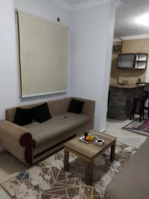 a living room with a couch and a coffee table at Hurghada city Apartment 4 in Hurghada