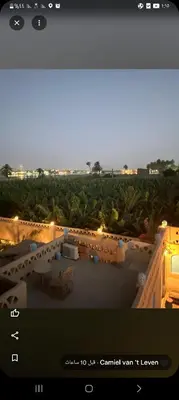 a screenshot of a hotel room with a view of a resort at Villa Rebecca Professor's paradise in Luxor