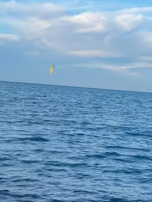 a kite flying over a large body of water at Fox house resort Apartment hotel in Hurghada