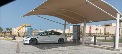 a white car parked at a gas station at Relaxing open Seaview Apartment in Hurghada
