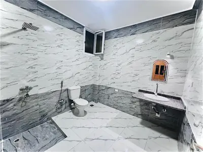 a bathroom with a toilet and a sink at Muhammad Ali House in Luxor