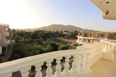 a view from the balcony of a house at Ramsses Palace in Luxor