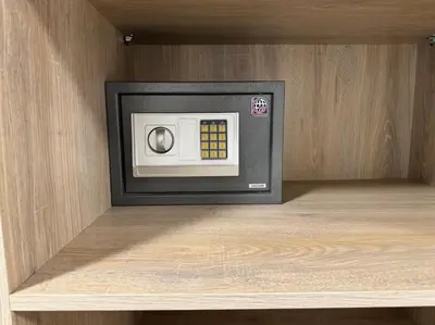 a microwave oven in a shelf in a cabinet at Relaxation, fresh air, and a direct view of the Nile in Naj‘ al ‘Amrāb
